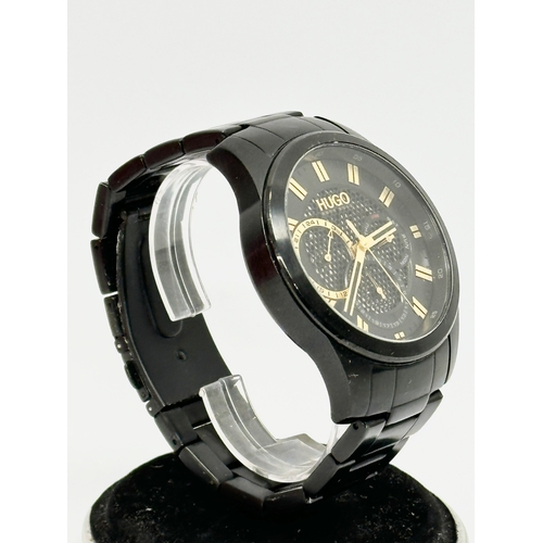 418 - A gents Hugo Boss ‘Skeleton’ watch with box. HU 433.1.34.3568 1.172.201