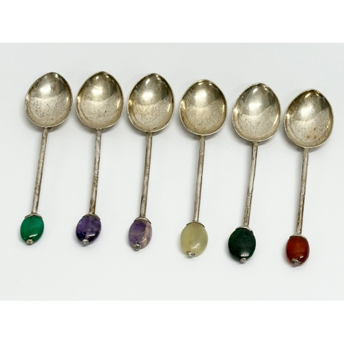 421 - A set of 6 1920s Liberty & Co silver cocktail spoons with stone set handles in original case. Amethy... 