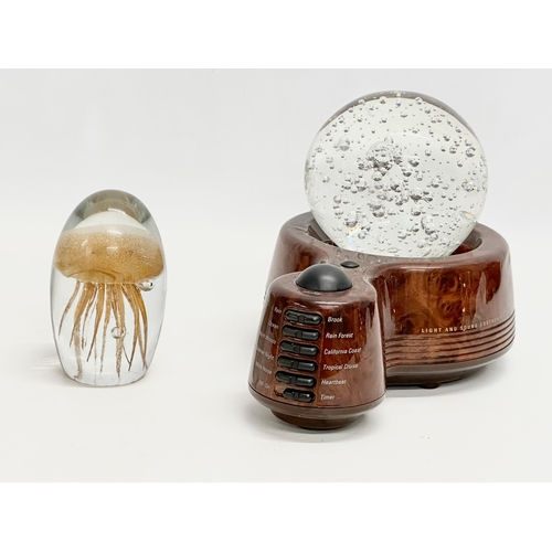 396 - A Sharper Image Design Light and Sound Soother with large Bubble Glass paperweight and a Jellyfish p... 