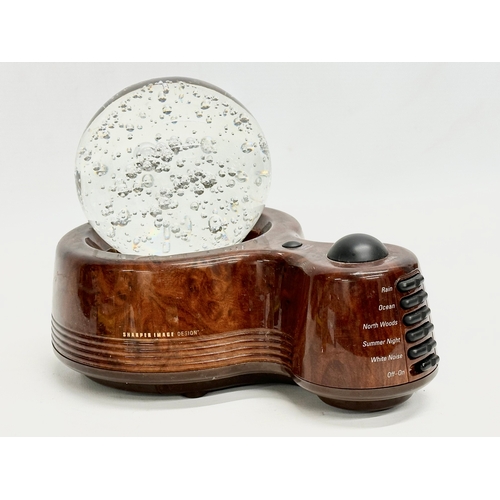 396 - A Sharper Image Design Light and Sound Soother with large Bubble Glass paperweight and a Jellyfish p... 