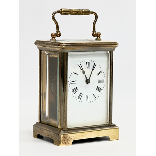 49 - A late 19th century Richard & Co brass carriage clock with key. Paris, France. 8x6.5x12cm