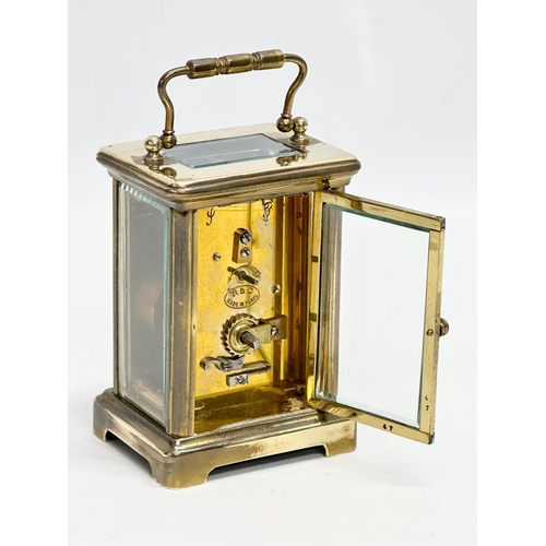 49 - A late 19th century Richard & Co brass carriage clock with key. Paris, France. 8x6.5x12cm