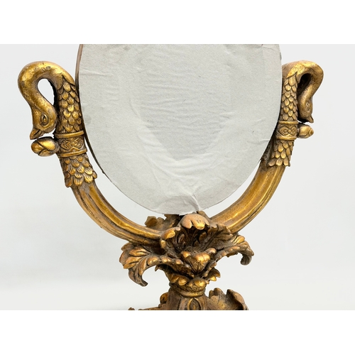 51 - A pair of large gilt framed tabletop mirrors/dressing mirrors. 46x63cm