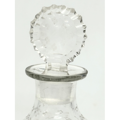 61 - An early 20th century etched Irish Clover glass decanter. 22cm