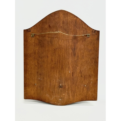 97 - A large late 19th/early 20th century chip carved birch wall hanging paper rack. Circa 1900. 34x44cm