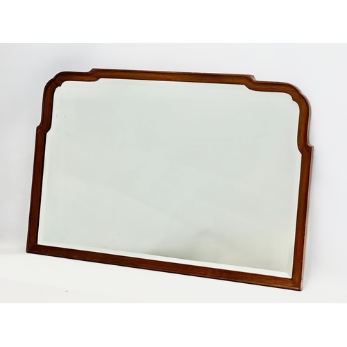 380 - An early 20th century mahogany framed bevelled mirror. Circa 1920. 75x49cm