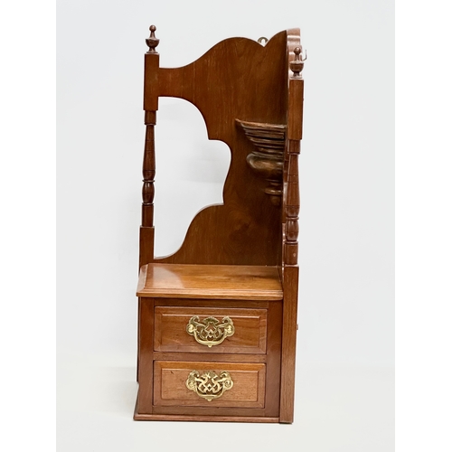 377 - A late Victorian walnut corner wall bracket with 2 drawers. Circa 1890-1900. 25x23x60cm