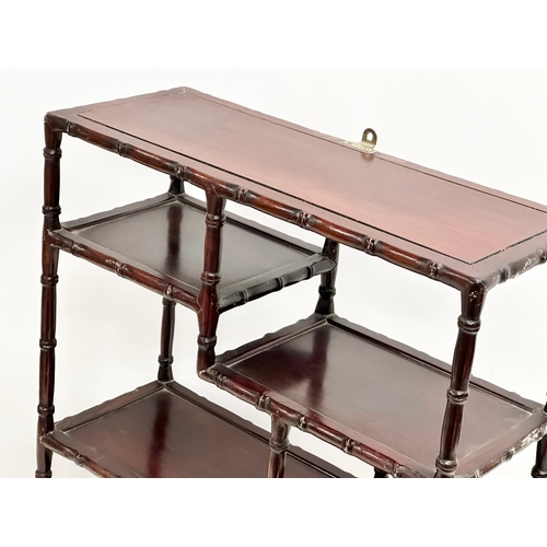 375 - A vintage Chinese rosewood tabletop bogu display stand with bamboo style supports. 48x20x58cm