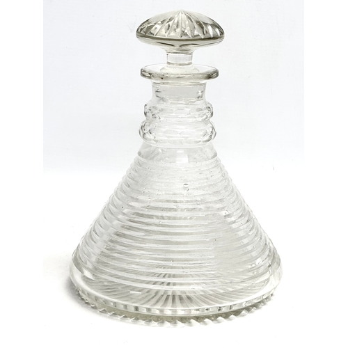 148 - A late 19th/early 20th century George III Revival ships decanter, with slice sharp cut sides and 2 r... 