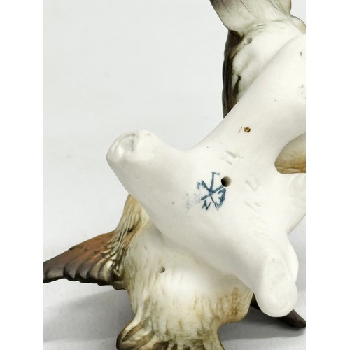 372 - A collection of pottery birds. Goebel x3. Bewick x1 (chipped beak) Royal Osborne x2 and more.