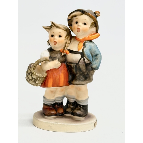 371 - 4 West German M.J. Hummel Goebel pottery figurines.