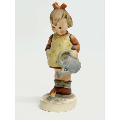 371 - 4 West German M.J. Hummel Goebel pottery figurines.