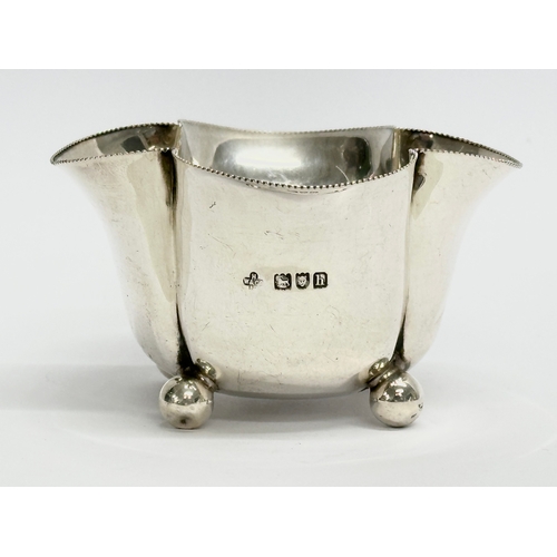 431 - A Horace Woodward & Co Ltd silver sugar bowl and matching cream jug. Circa 1893-1919. London. 133.78... 