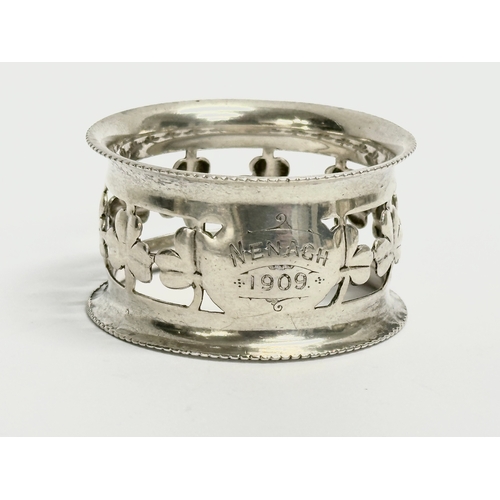 432 - A George Nathan Ridley Hayes silver napkin ring with Irish shamrock decoration, 18.57 grams. A tall ... 