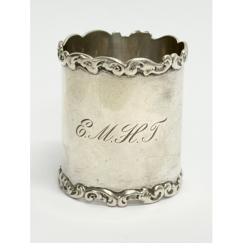 432 - A George Nathan Ridley Hayes silver napkin ring with Irish shamrock decoration, 18.57 grams. A tall ... 