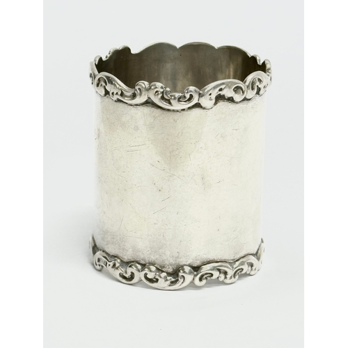 432 - A George Nathan Ridley Hayes silver napkin ring with Irish shamrock decoration, 18.57 grams. A tall ... 