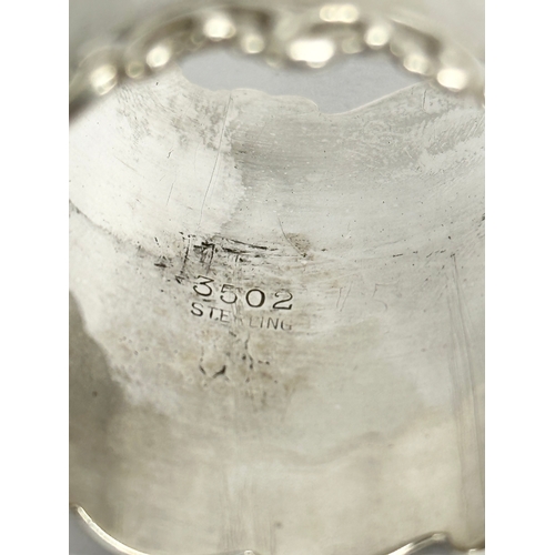 432 - A George Nathan Ridley Hayes silver napkin ring with Irish shamrock decoration, 18.57 grams. A tall ... 