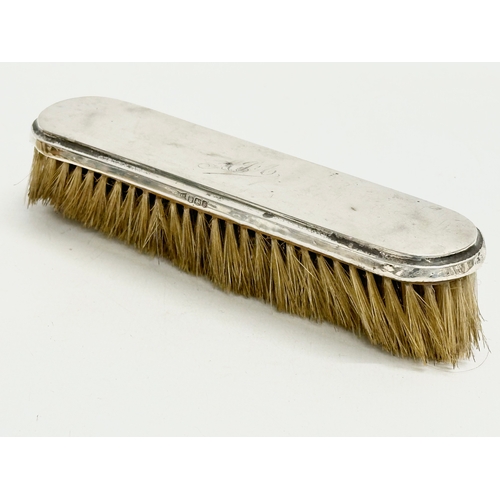 438 - 3 late 19th/early 20th century silver vanity brushes.