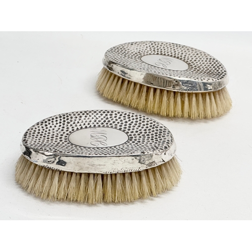 438 - 3 late 19th/early 20th century silver vanity brushes.