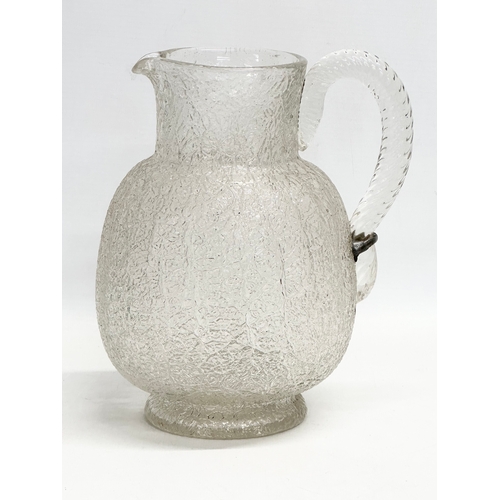 137 - A large 19th century Crackle Glass water jug. Circa 1860-1880. 18x14x21cm