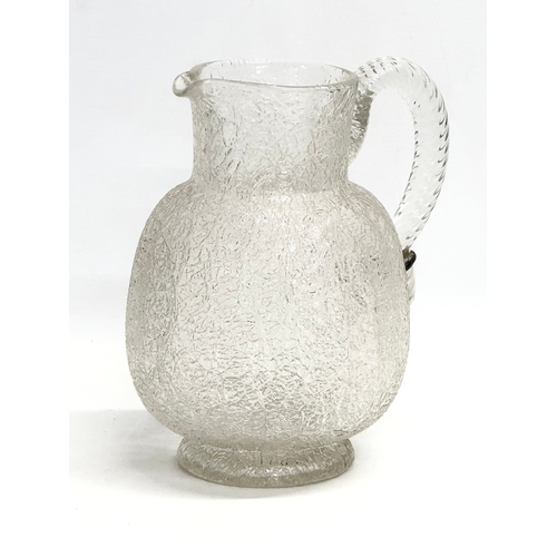 137 - A large 19th century Crackle Glass water jug. Circa 1860-1880. 18x14x21cm