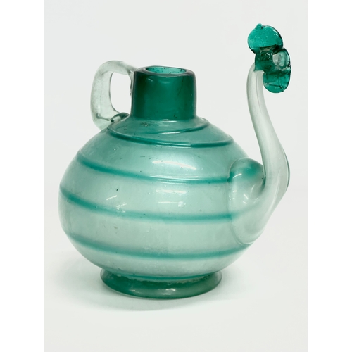 138 - A rare 18th century handblown vessel ewer. Circa 1760-1800. 15x12.5x17cm