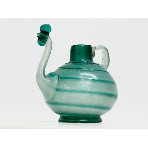 138 - A rare 18th century handblown vessel ewer. Circa 1760-1800. 15x12.5x17cm