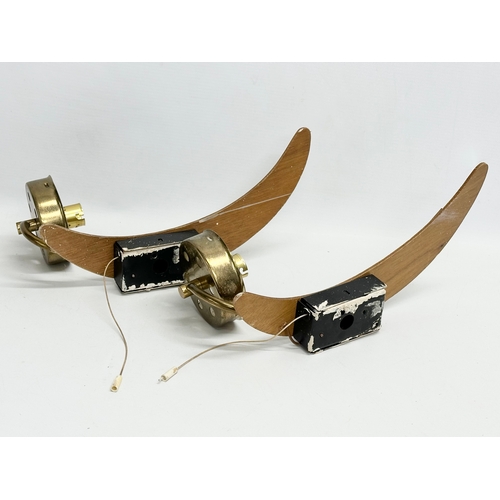 181 - A pair of 1960’s Mid Century teak and brass wall lights with glass shades. 31cm