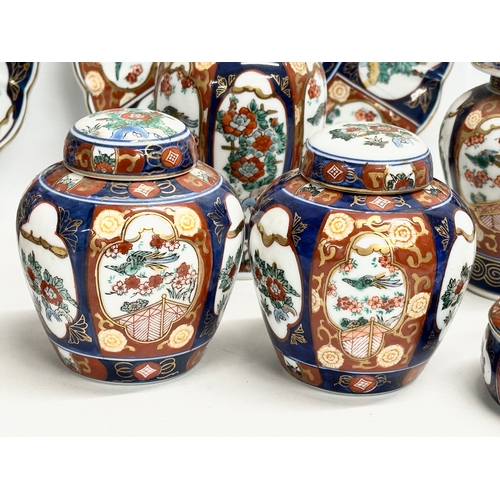 364 - A collection of vintage Japanese Gold Imari hand painted pottery. A pair of ginger jars with covers ... 