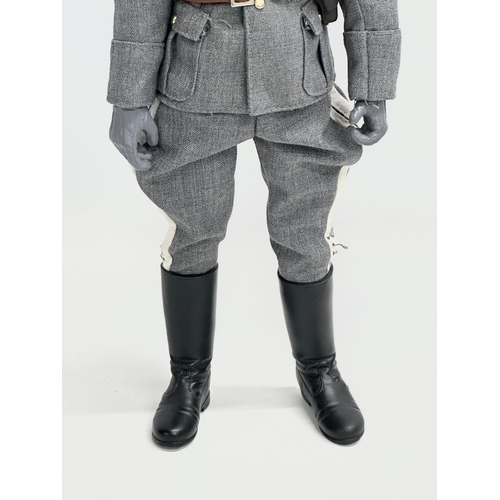 545 - A Dragon Models LTD WWII German Luftwaffe officer action figure. 31cm