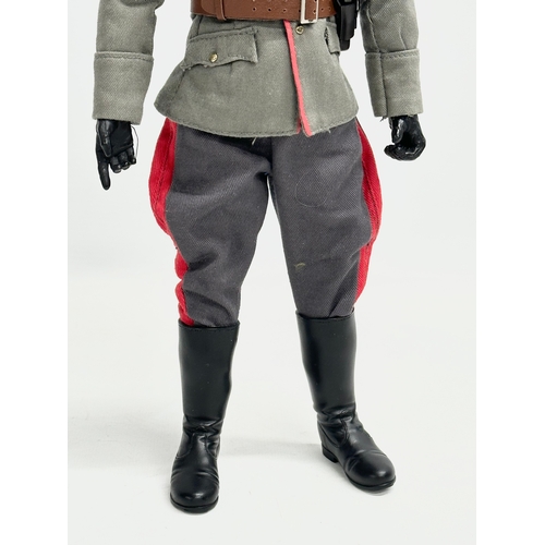 546 - A Dragon Models LTD WWII German General action figure. 31cm