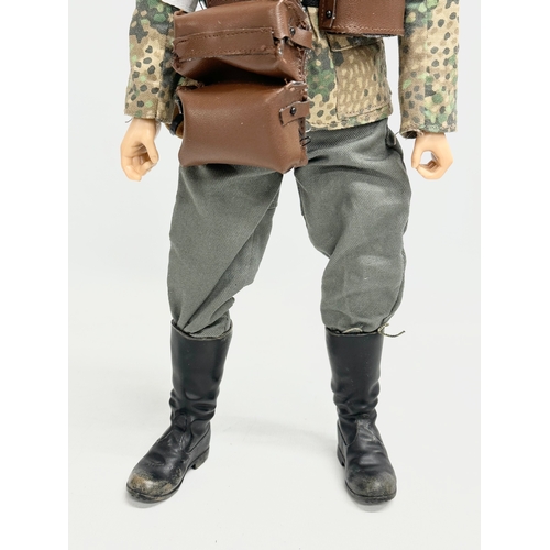 550 - A Dragon Models LTD WWII German Medic action figure. 31cm