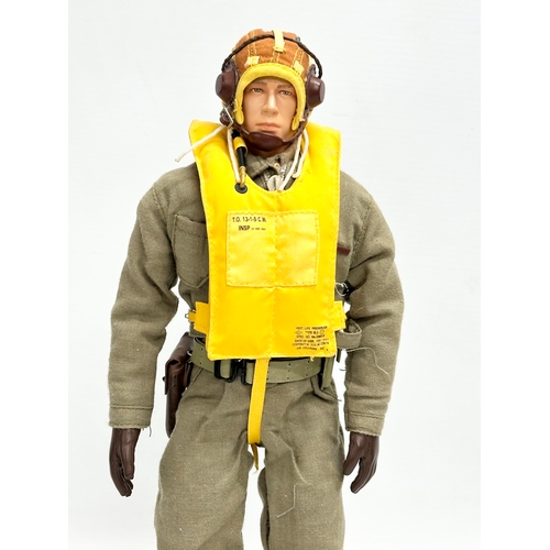 551 - A Dragon Models LTD WWII US Pilot action figure. 31cm