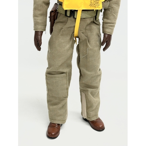 551 - A Dragon Models LTD WWII US Pilot action figure. 31cm