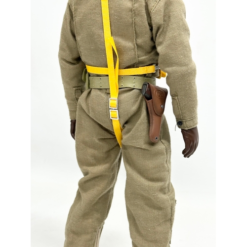 551 - A Dragon Models LTD WWII US Pilot action figure. 31cm