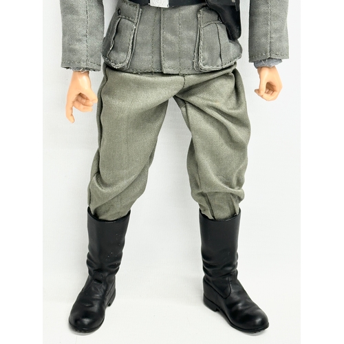 552 - A Dragon Models LTD WWII German Wehrmacht officer action figure. 31cm