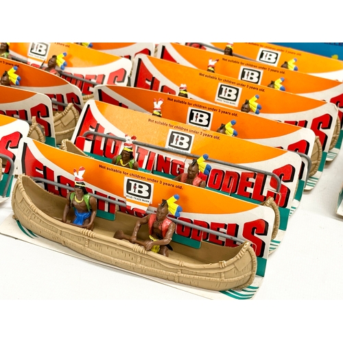 562 - A vintage Britains Herald Floating Models 14 Indian Canoes with original box.