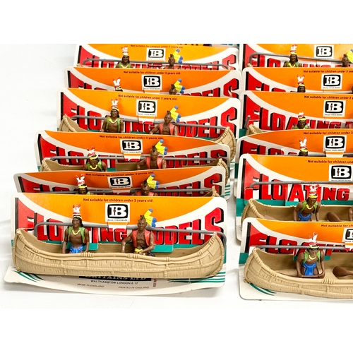 562 - A vintage Britains Herald Floating Models 14 Indian Canoes with original box.