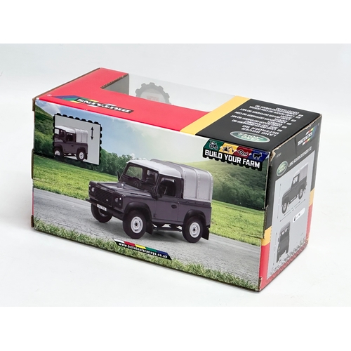 615 - A new Britains Land Rover Defender 90 with box. 20x10x11cm