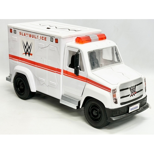 624 - Mattel 2020 WWE collection. A Raw WWE wrestling ring with 9 figures and a WWE ambulance. Ring measur... 