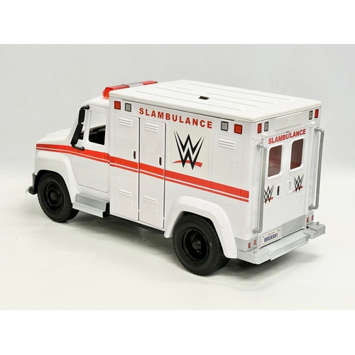 624 - Mattel 2020 WWE collection. A Raw WWE wrestling ring with 9 figures and a WWE ambulance. Ring measur... 