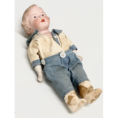 531 - An early 20th century Heubach bisque doll. Circa 1910-1920. 24cm