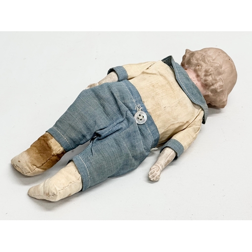 531 - An early 20th century Heubach bisque doll. Circa 1910-1920. 24cm