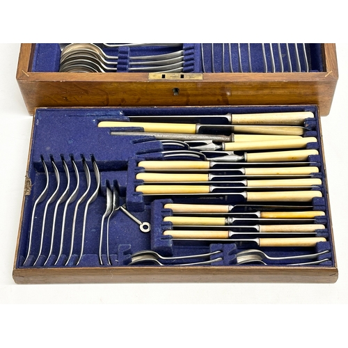 356 - A large good quality vintage oak cased cutlery set. 45x30x12cm