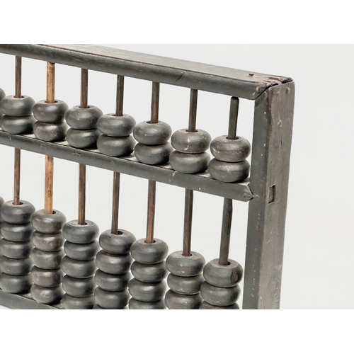 354 - A late 19th/early 20th century Chinese Abacus. 35x17cm