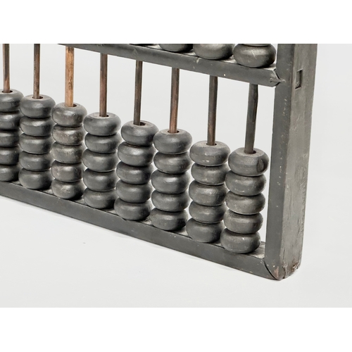 354 - A late 19th/early 20th century Chinese Abacus. 35x17cm