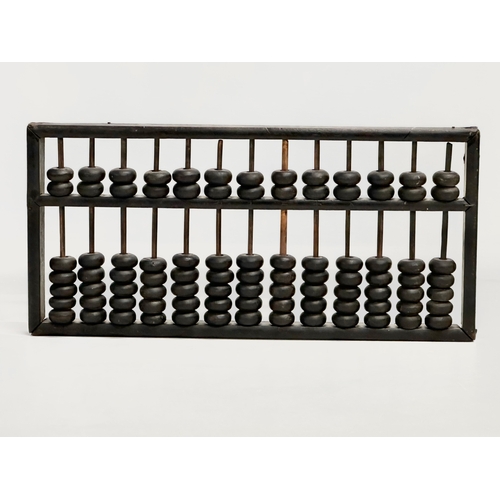 354 - A late 19th/early 20th century Chinese Abacus. 35x17cm