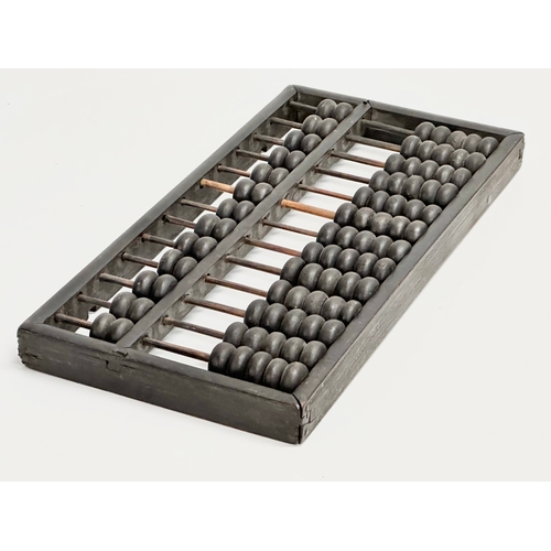 354 - A late 19th/early 20th century Chinese Abacus. 35x17cm