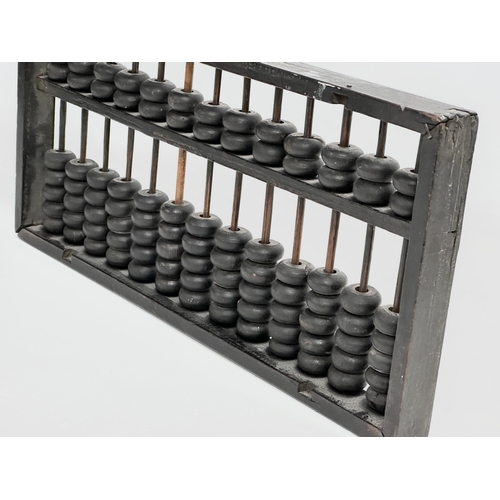 354 - A late 19th/early 20th century Chinese Abacus. 35x17cm