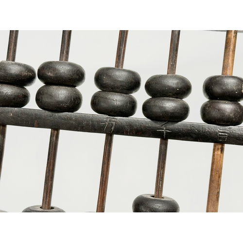 354 - A late 19th/early 20th century Chinese Abacus. 35x17cm